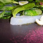 tamarind powder dusts this plate of salted raw cod, mint, cucumber & fresh almonds