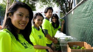 Cant miss Team Boobs4Food in our neon SF Street Food Fest Volunteer Tees as we help cut limes for cocktails.